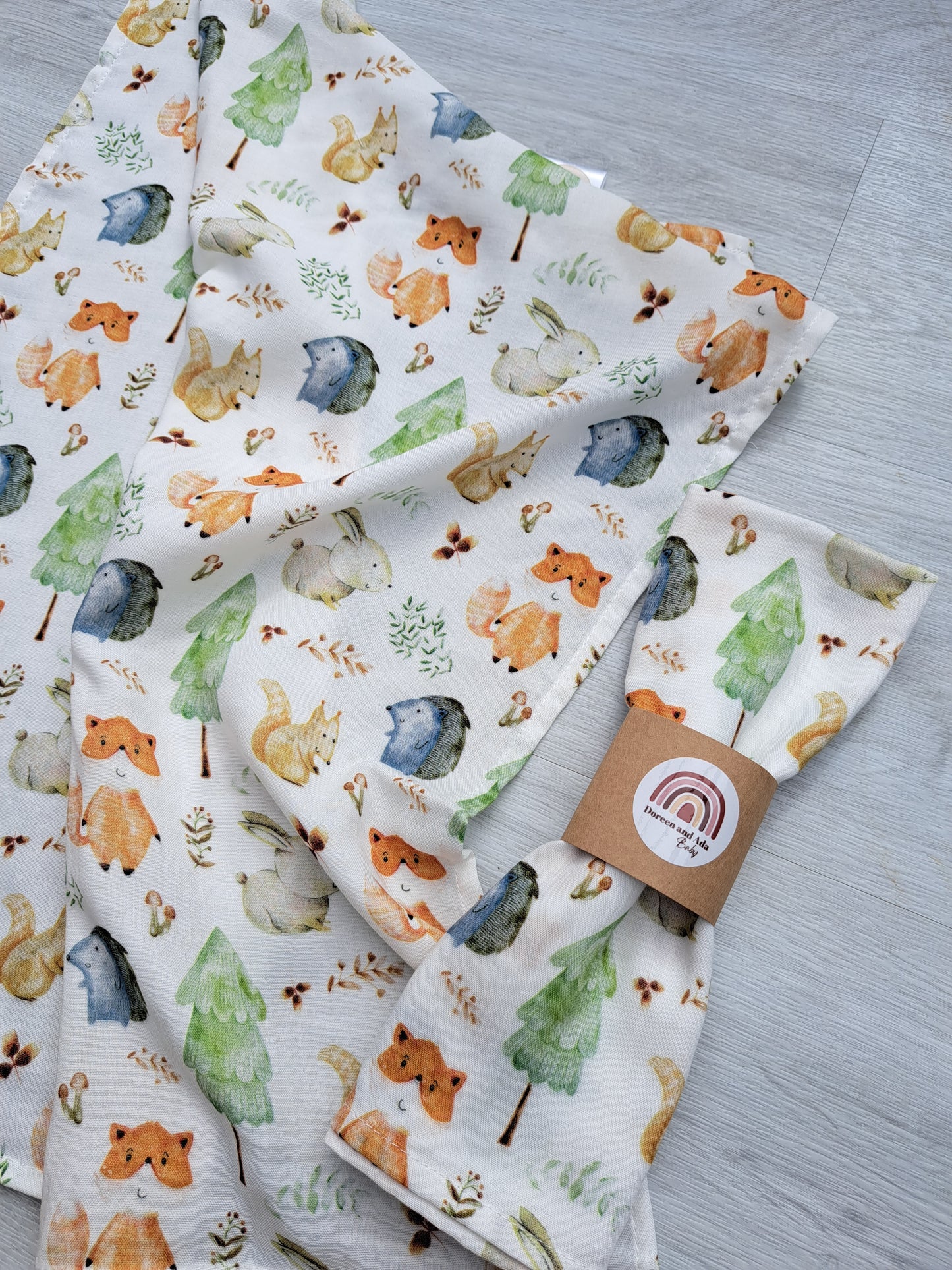 Forest animals print organic cotton muslin square with woodland creatures design for babies