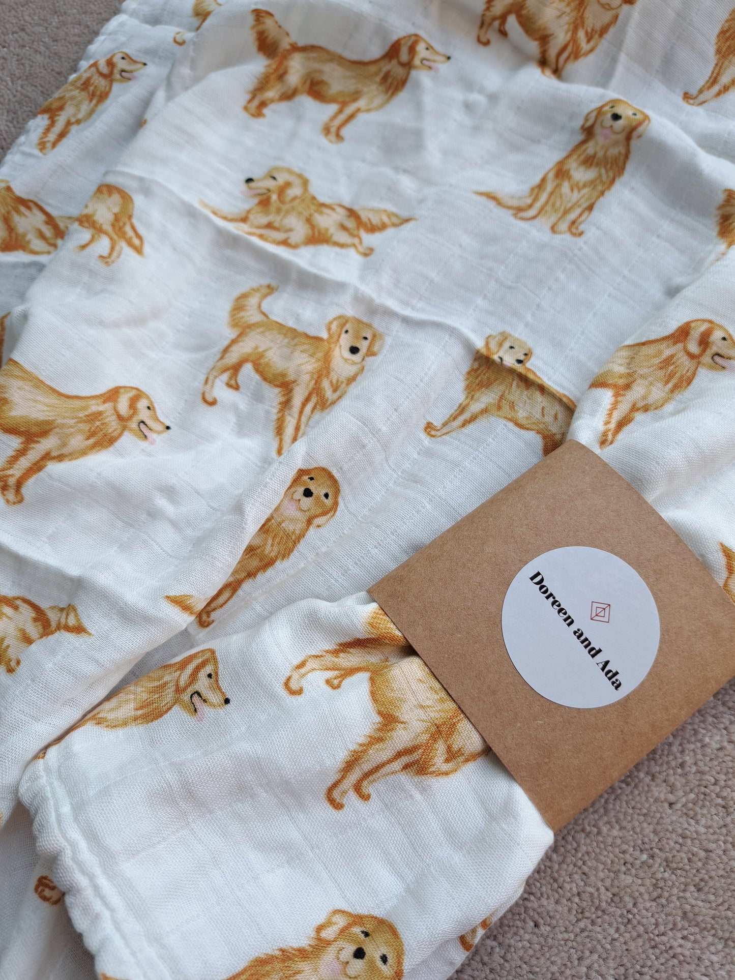 Folded golden retriever muslin showing dog pattern