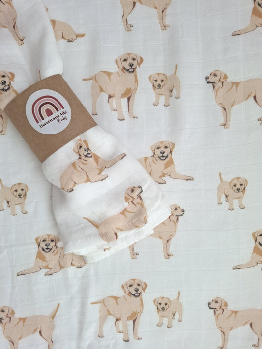Close-up of golden labrador puppies design on super soft cotton muslin fabric