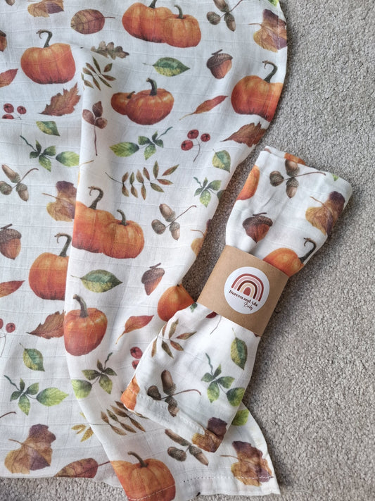 Rolled Autumn Harvest muslin square on matching muslin cloth background