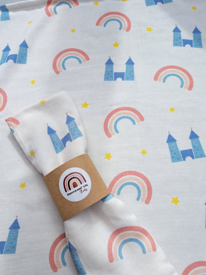 Princess castle and rainbow print organic cotton muslin square with fairy tale design