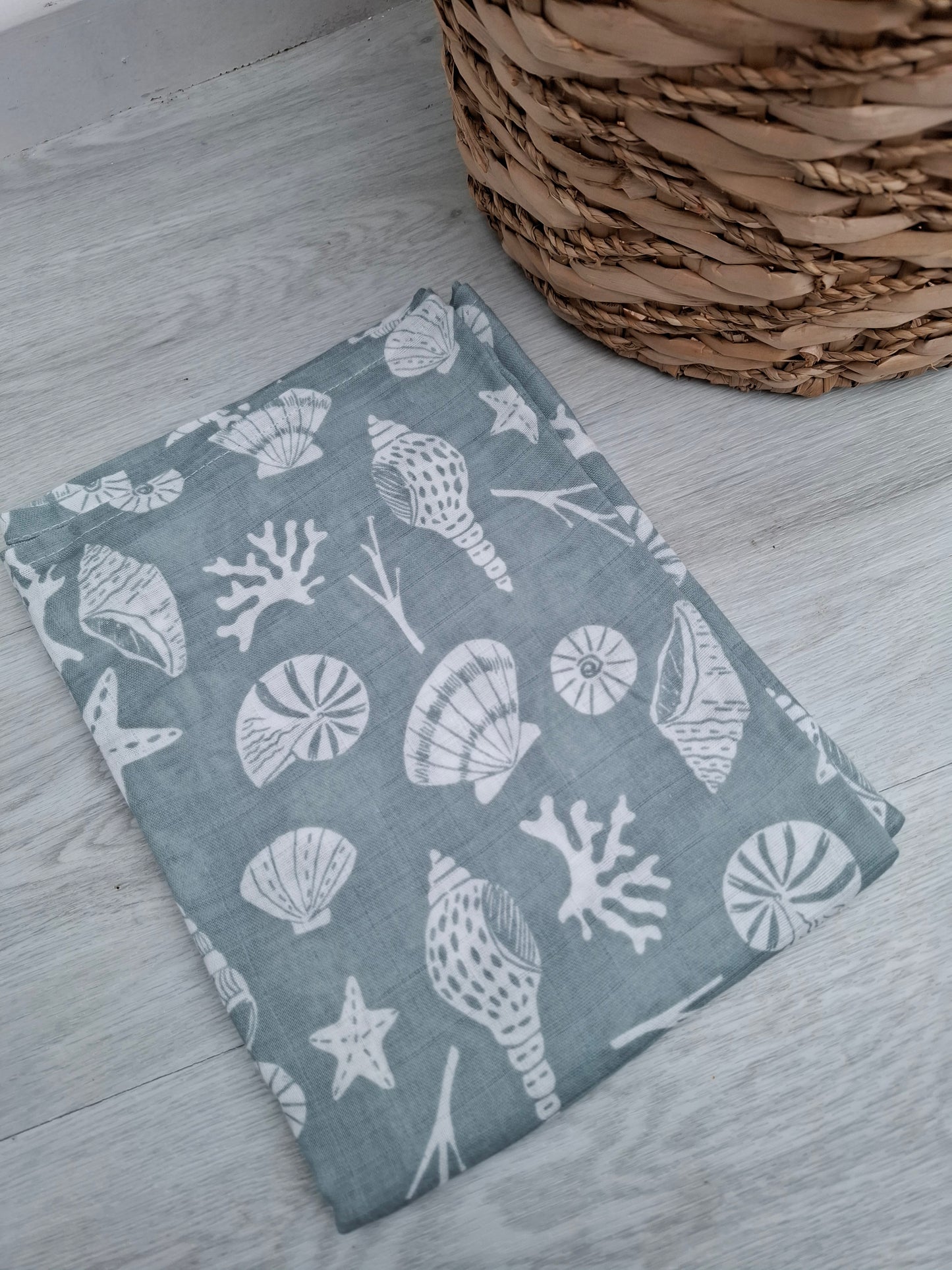 Seashell Muslin Swaddle by Doreen and Ada