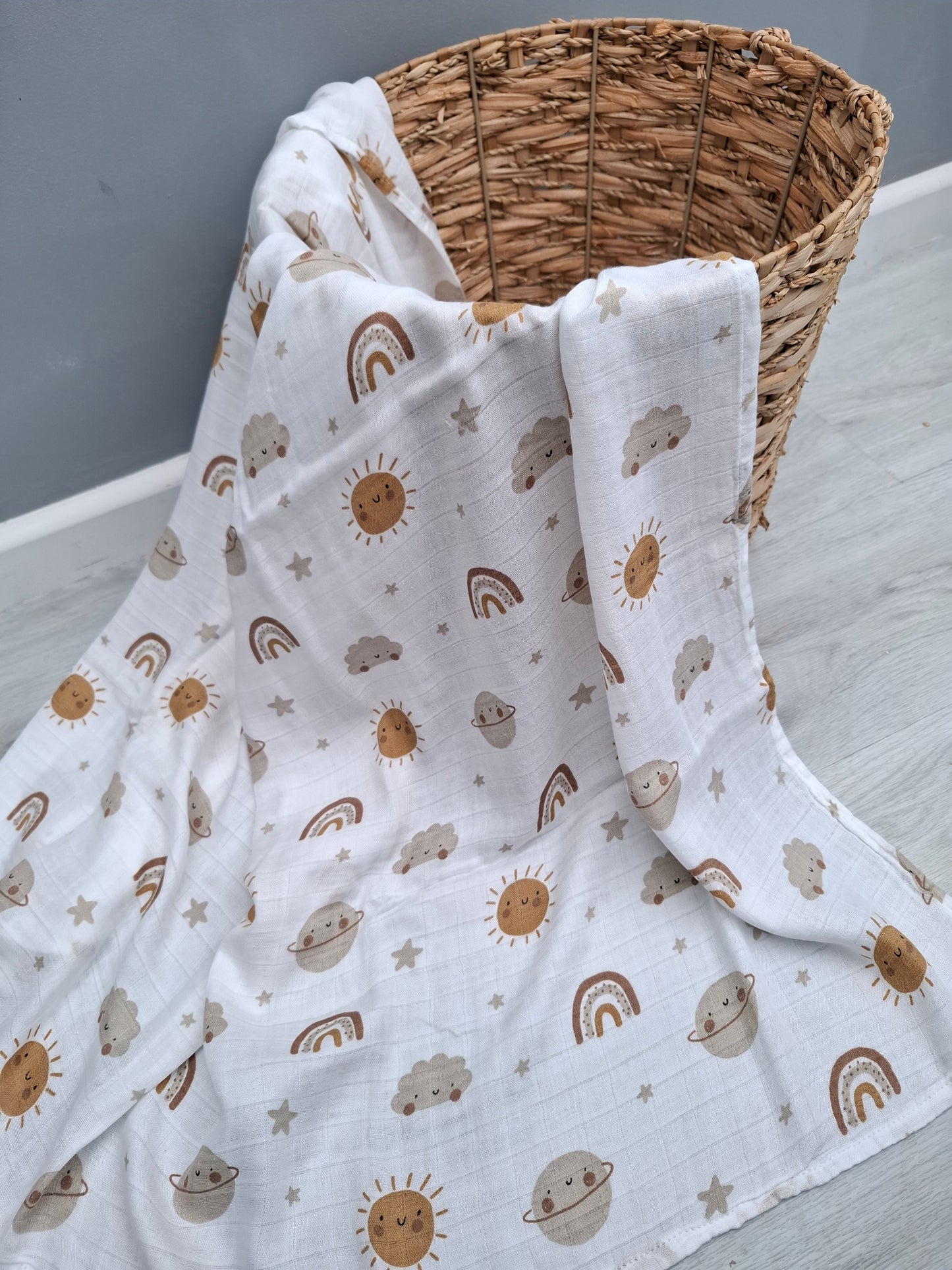 Sun, Planets and Rainbow Muslin Swaddle by Doreen and Ada