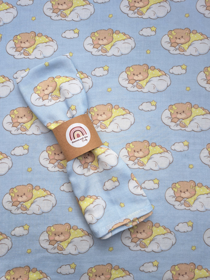 Kawaii sleeping teddy bear in the clouds print organic cotton muslin square with dreamy design