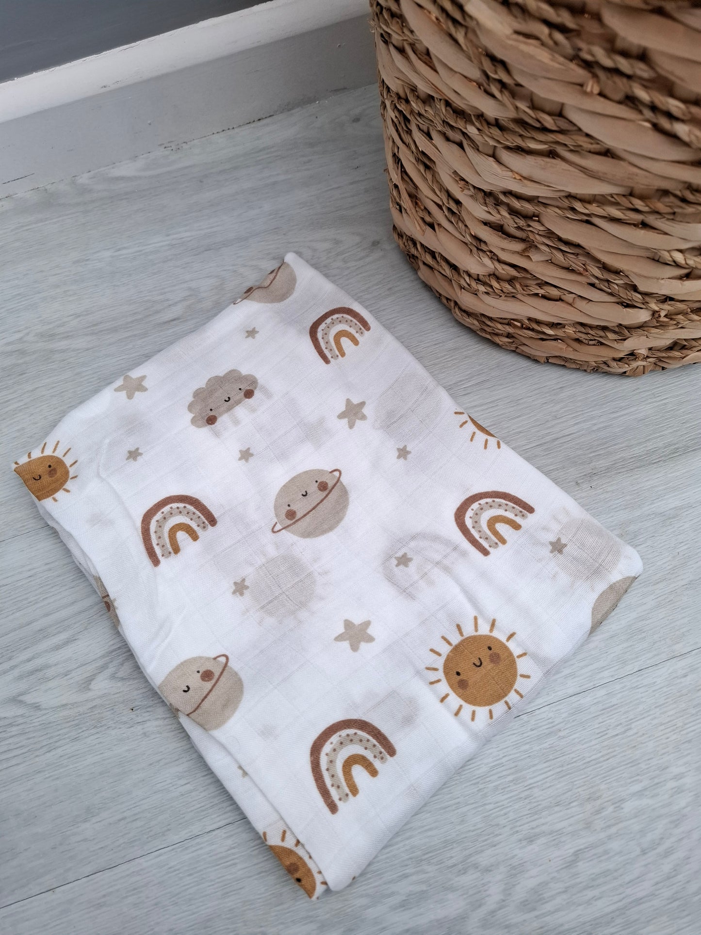 Sun, Planets and Rainbow Muslin Swaddle by Doreen and Ada