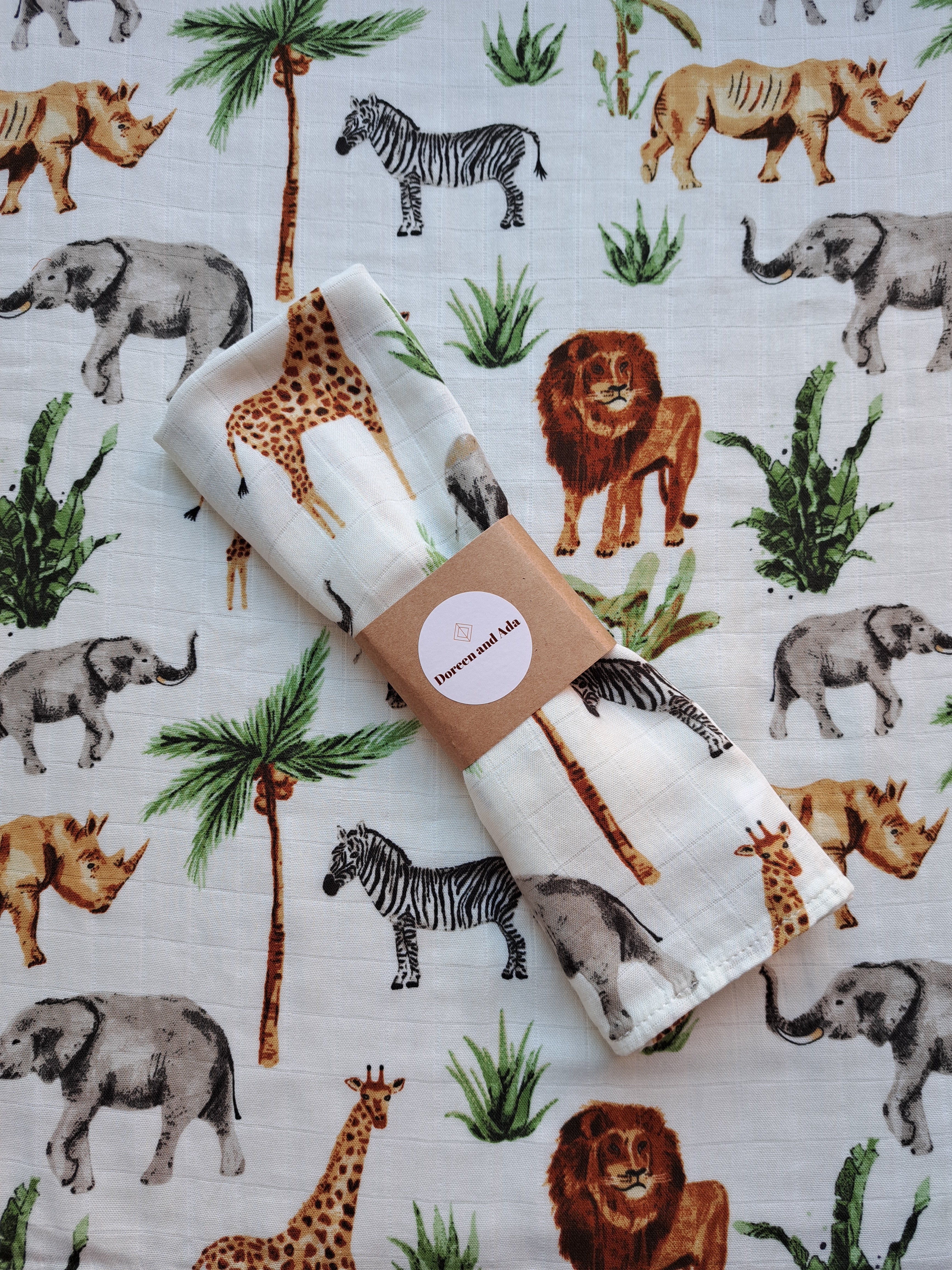 Safari jungle animal kingdom print organic cotton muslin square with wild animals design
