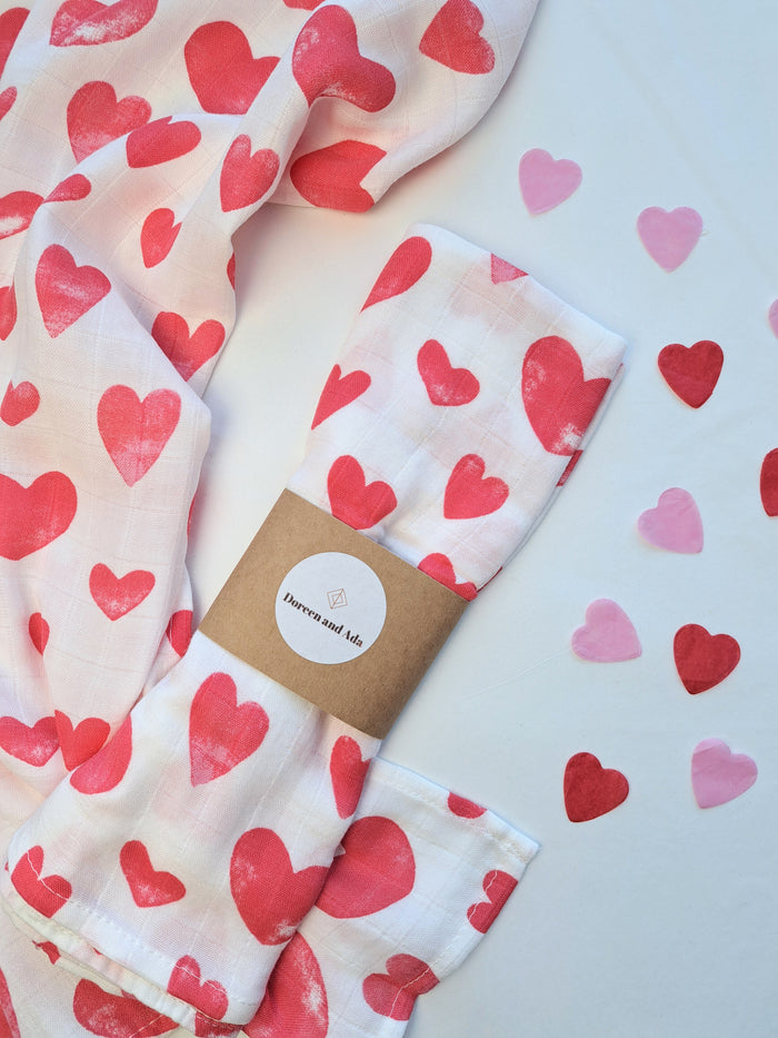 Love heart Valentine's Day print organic cotton muslin square with pink and red hearts